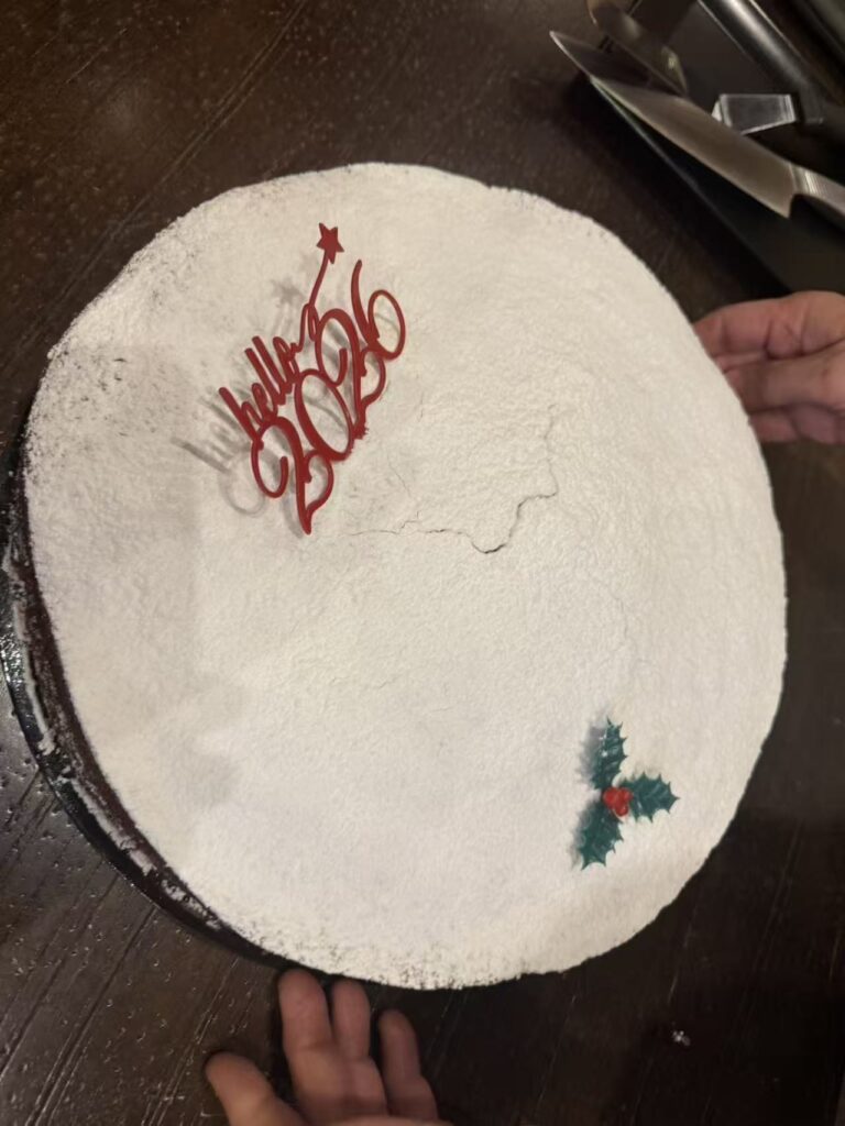 Vasilopita cake with “Hello 2026” topper from Hellas Group’s New Year team-building celebration in Nemea.